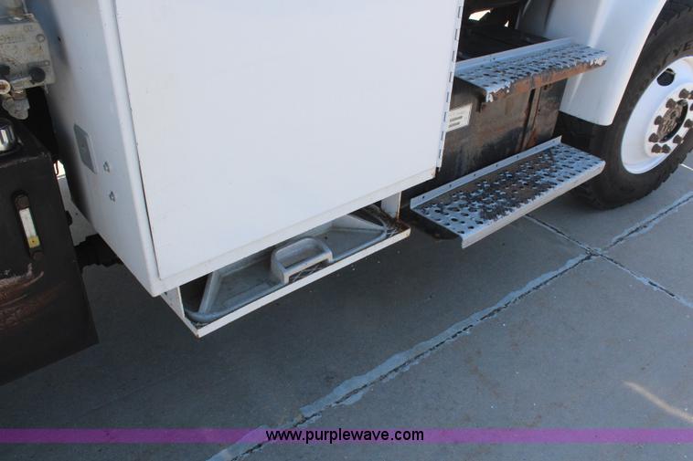 image for item H6088 2003 Freightliner FL80 flatbed truck with knuckle boom crane