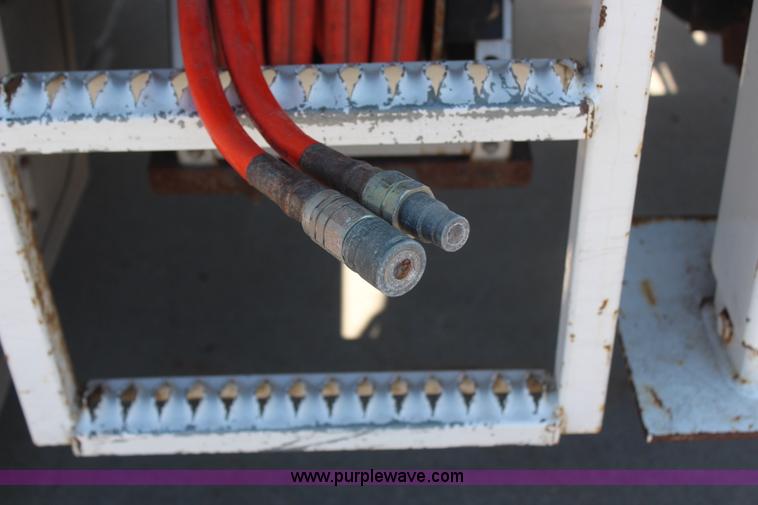 image for item H6088 2003 Freightliner FL80 flatbed truck with knuckle boom crane