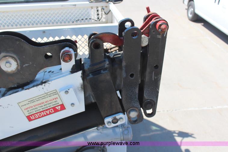 image for item H6088 2003 Freightliner FL80 flatbed truck with knuckle boom crane