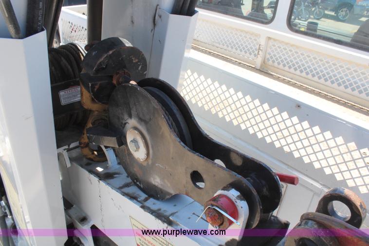 image for item H6088 2003 Freightliner FL80 flatbed truck with knuckle boom crane