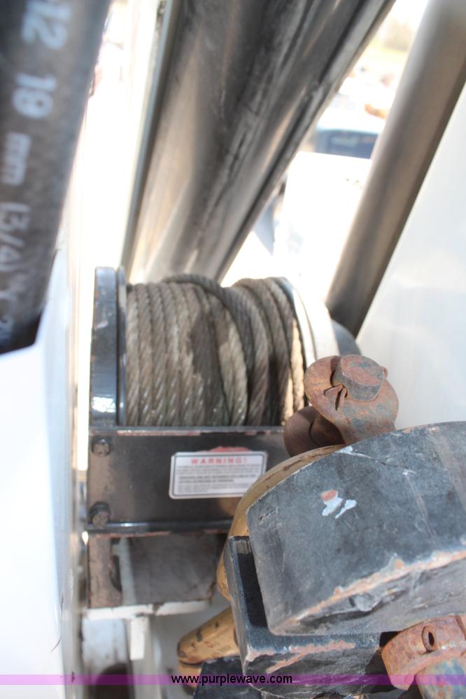 image for item H6088 2003 Freightliner FL80 flatbed truck with knuckle boom crane