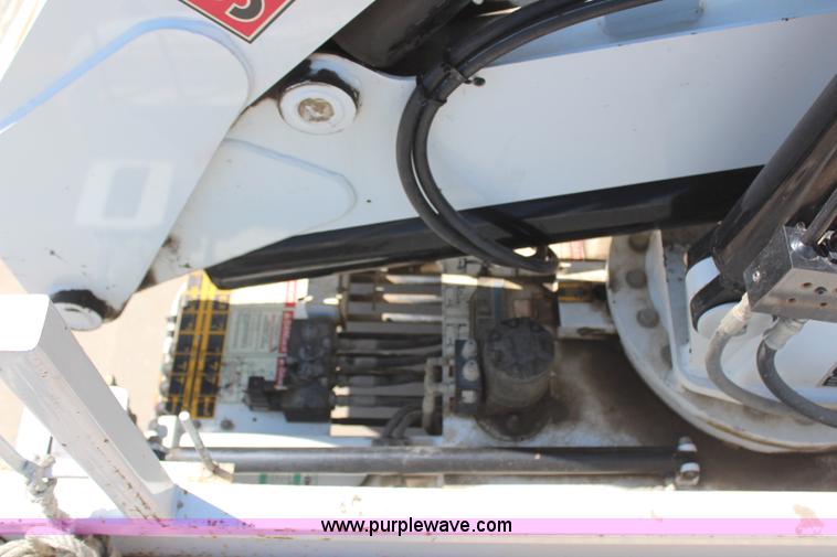 image for item H6088 2003 Freightliner FL80 flatbed truck with knuckle boom crane