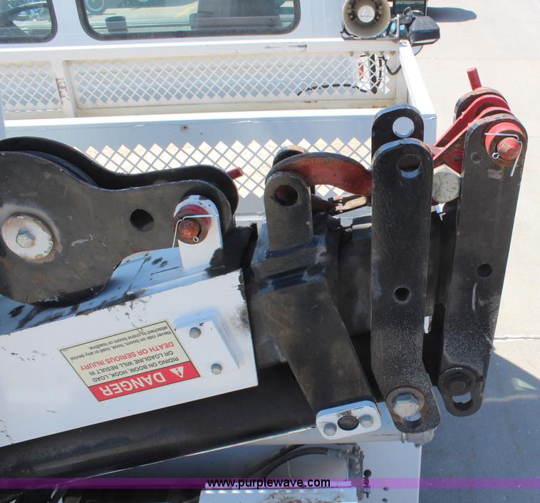 image for item H6088 2003 Freightliner FL80 flatbed truck with knuckle boom crane