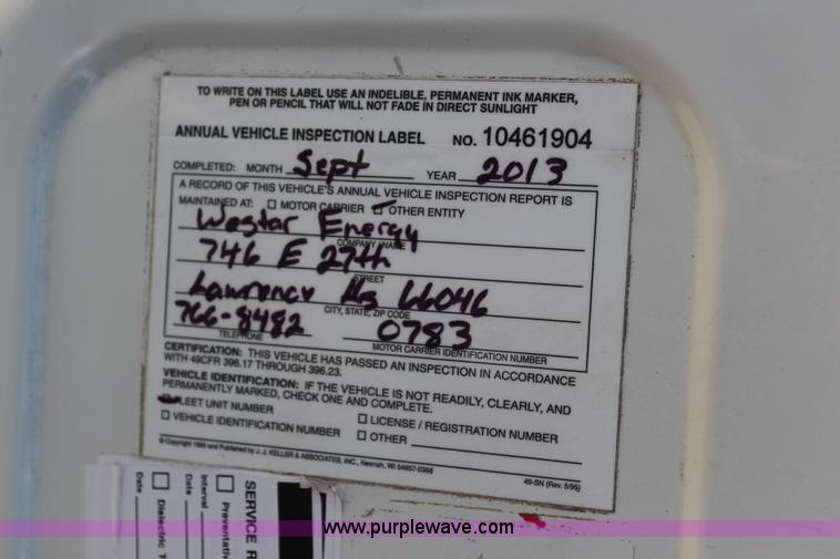 image for item H6088 2003 Freightliner FL80 flatbed truck with knuckle boom crane