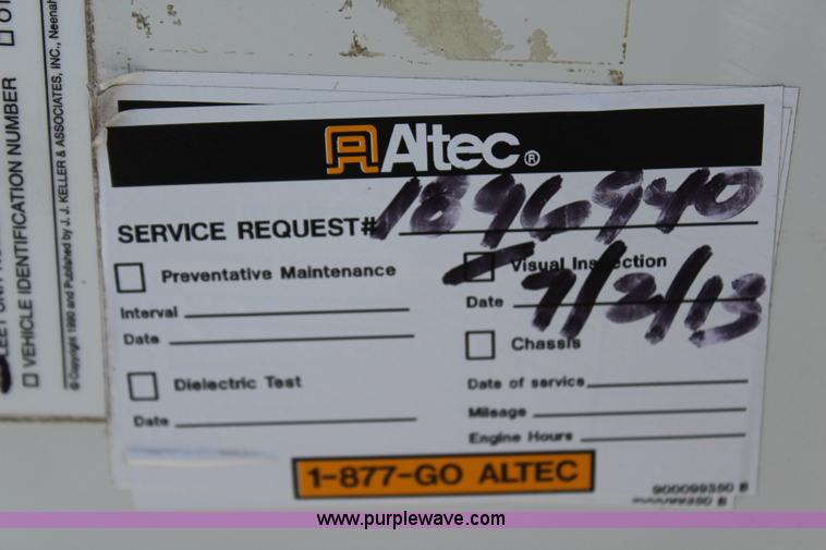 image for item H6088 2003 Freightliner FL80 flatbed truck with knuckle boom crane