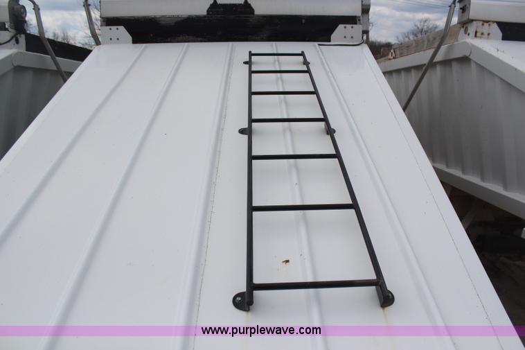 image for item H6151 2009 Construction Trailer Specialist, Inc. BDT-40 belly dump trailer