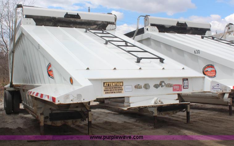 image for item H6152 2009 Construction Trailer Specialist, Inc. BDT-40 belly dump trailer