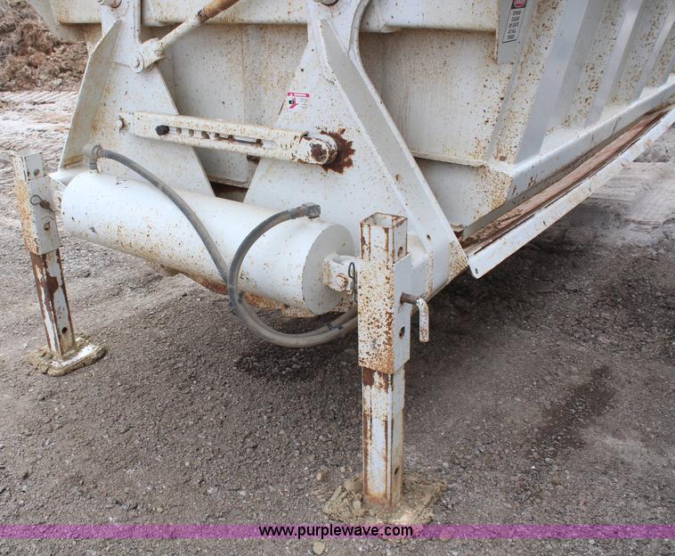 image for item H6159 2007 Manac LWBD-240 belly dump trailer