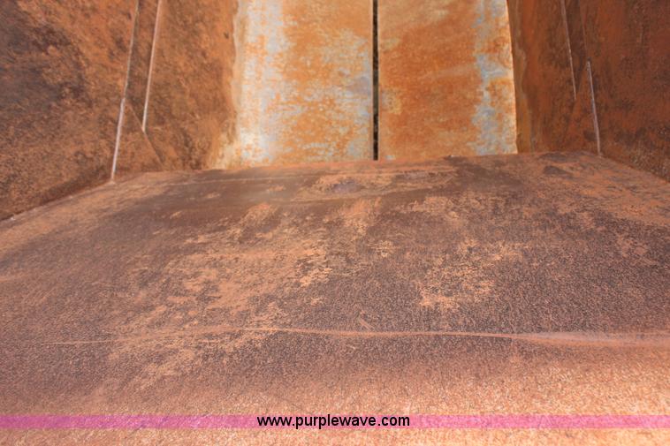 image for item H6159 2007 Manac LWBD-240 belly dump trailer