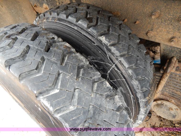 image for item I1011 1999 Mack CL713 triple axle dump truck