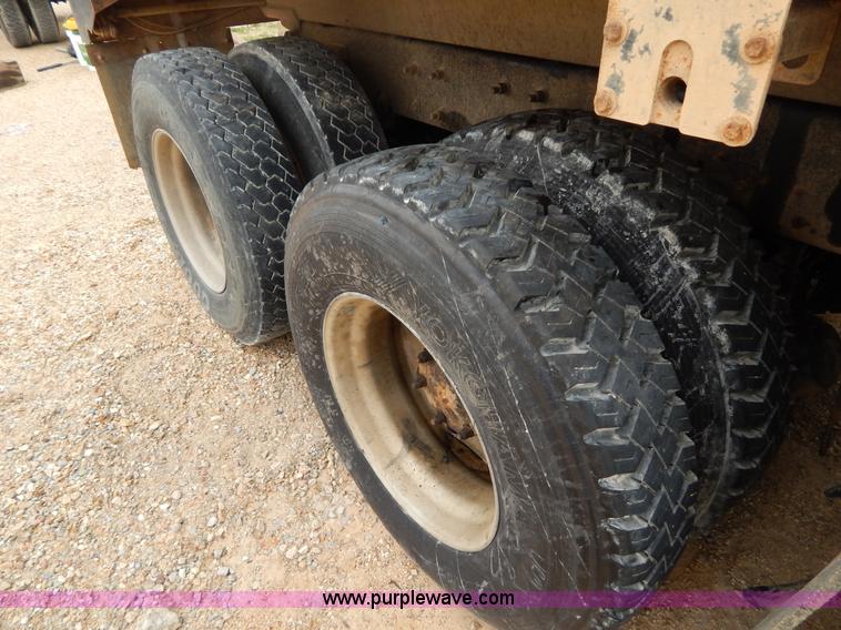 image for item I1011 1999 Mack CL713 triple axle dump truck