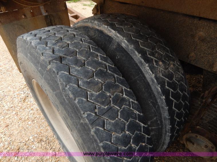 image for item I1011 1999 Mack CL713 triple axle dump truck