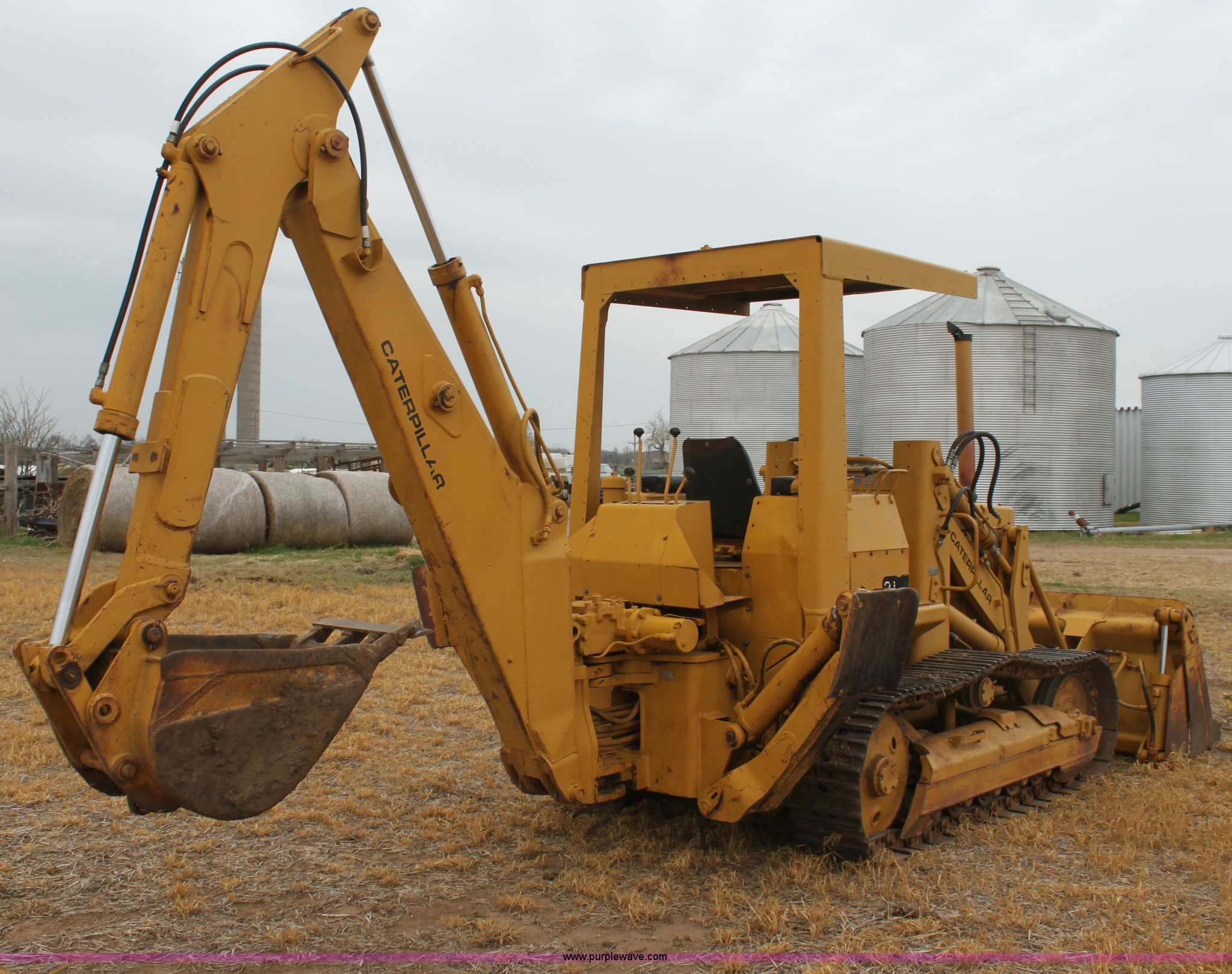 1979 Caterpillar 931 track loader with backhoe attachment in Conway