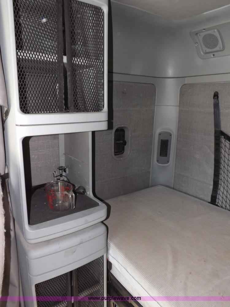 image for item I9003 2006 Freightliner ST120 semi truck