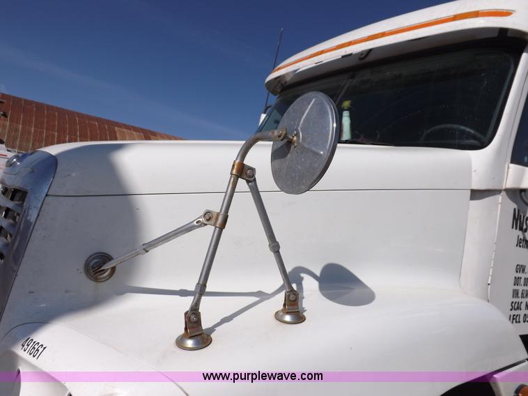 image for item I9003 2006 Freightliner ST120 semi truck