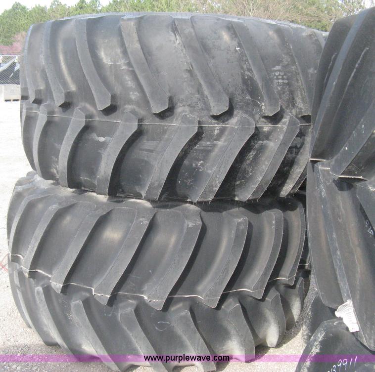 image for item AX9818 (2) aged Firestone 900/60R32 tire and wheel assemblies