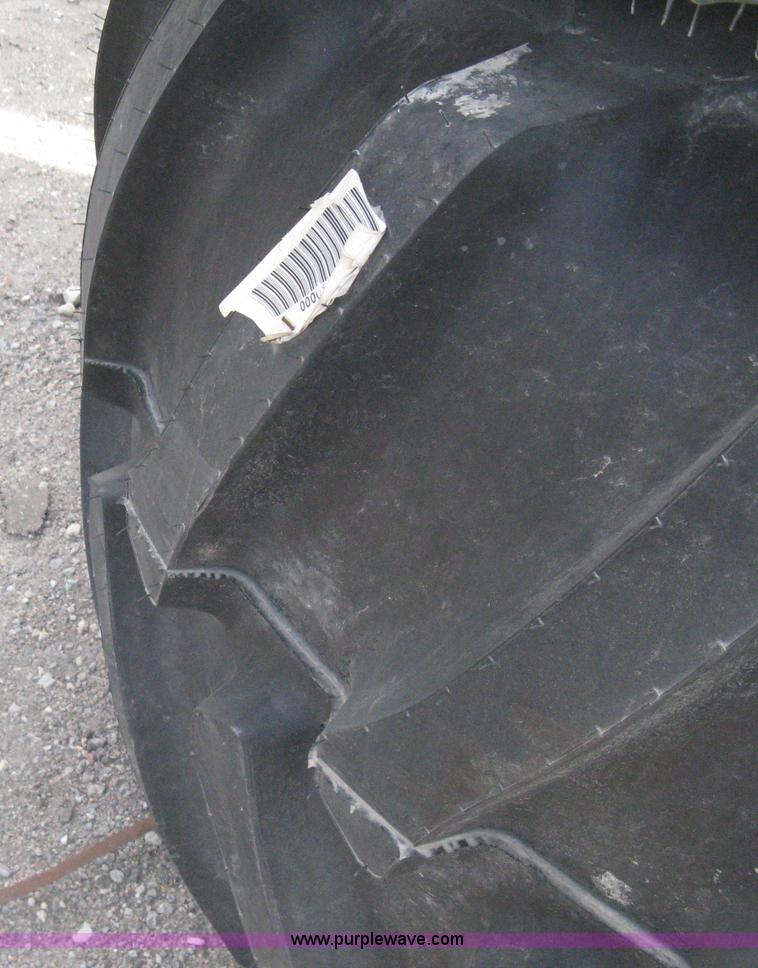 image for item AX9818 (2) aged Firestone 900/60R32 tire and wheel assemblies