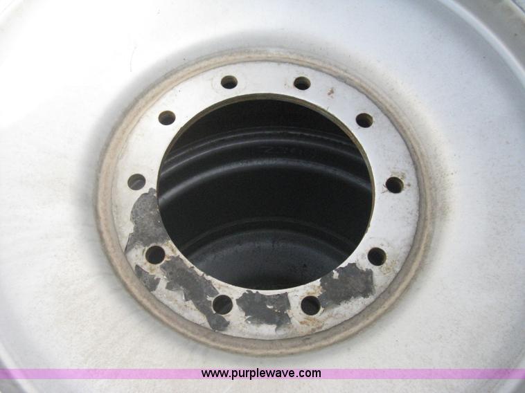 image for item AX9818 (2) aged Firestone 900/60R32 tire and wheel assemblies