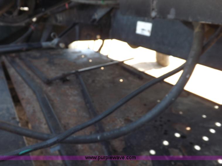 image for item H1939 2002 Mac Don 9352 Turbo swather