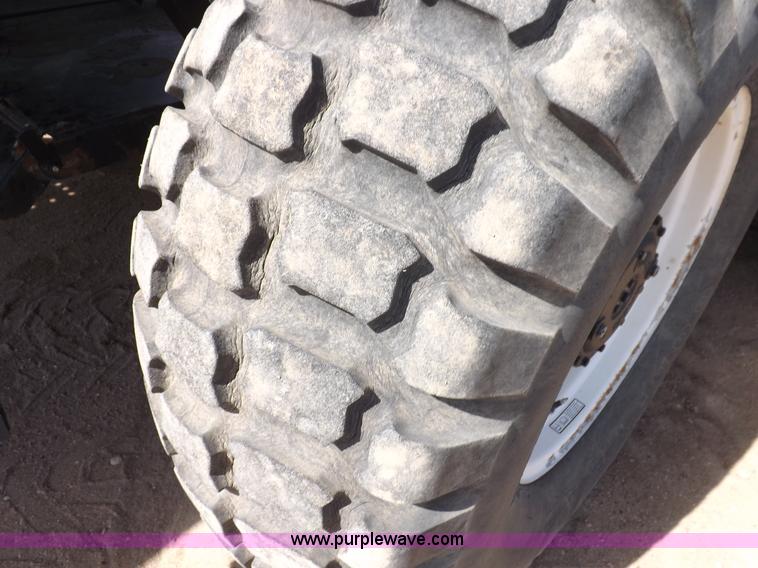 image for item H1939 2002 Mac Don 9352 Turbo swather