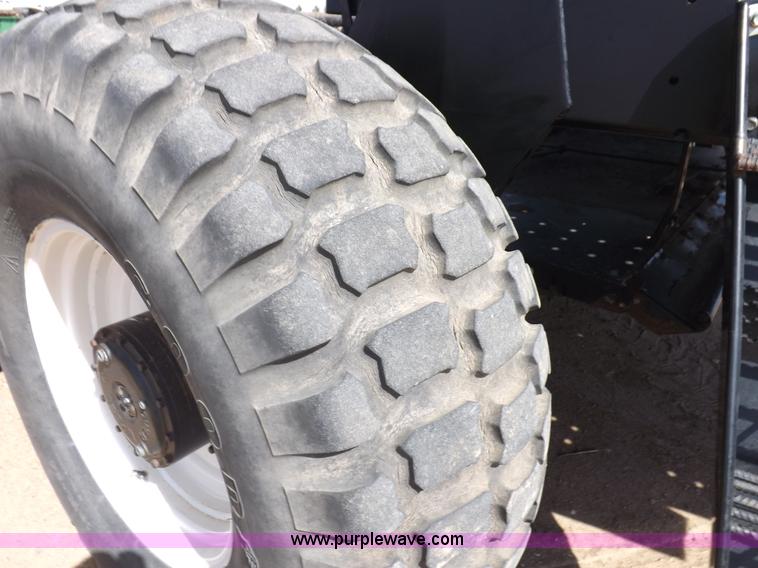 image for item H1939 2002 Mac Don 9352 Turbo swather