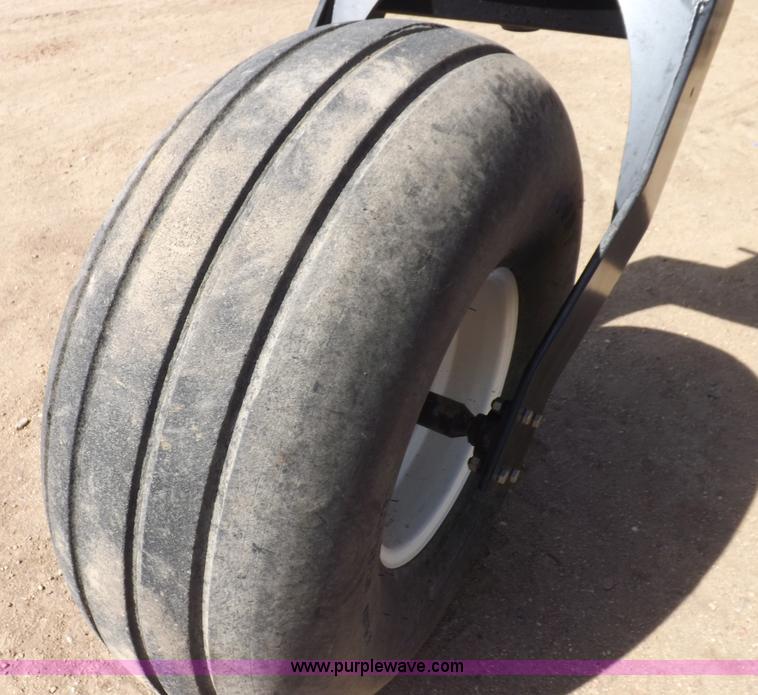 image for item H1939 2002 Mac Don 9352 Turbo swather