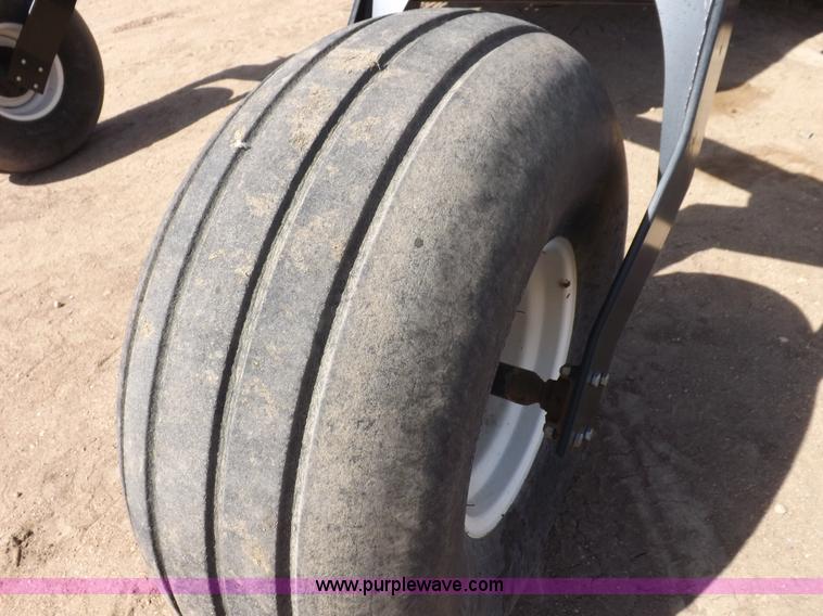 image for item H1939 2002 Mac Don 9352 Turbo swather