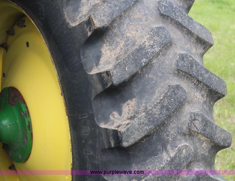 image for item H6135 2004 John Deere 7420 MFWD tractor