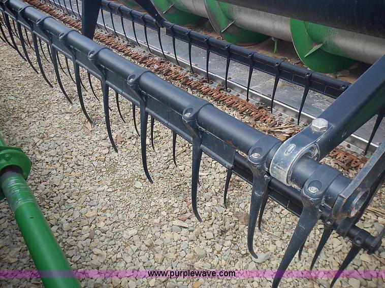 image for item I3671 2004 John Deere 630F Hydraflex platform head