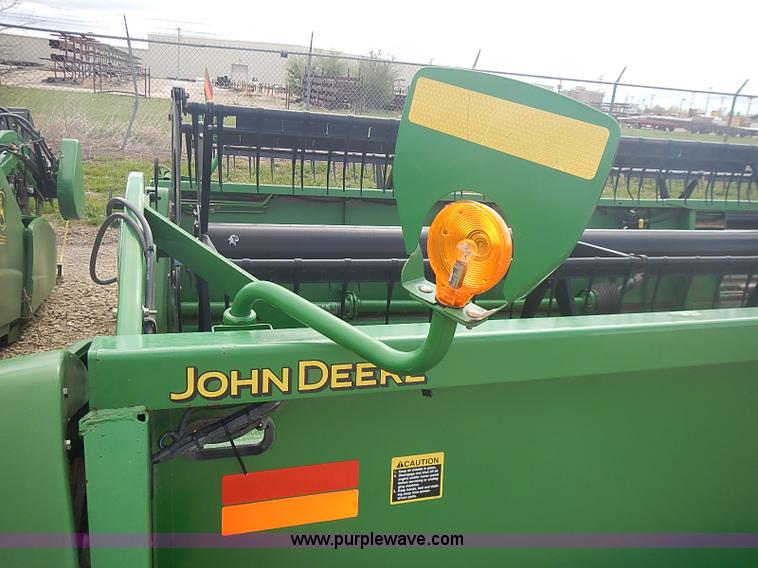image for item I3671 2004 John Deere 630F Hydraflex platform head