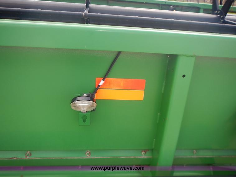 image for item I3671 2004 John Deere 630F Hydraflex platform head