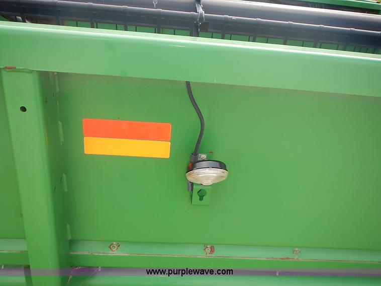 image for item I3671 2004 John Deere 630F Hydraflex platform head