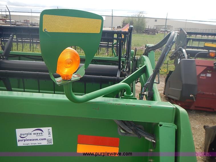 image for item I3671 2004 John Deere 630F Hydraflex platform head