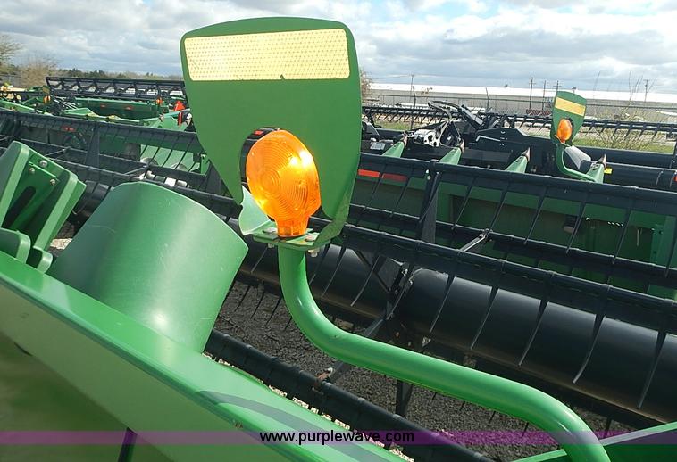 image for item I3679 2006 John Deere 635F Hydraflex platform head