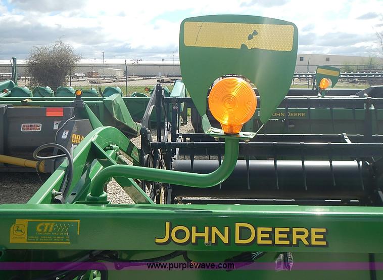 image for item I3679 2006 John Deere 635F Hydraflex platform head