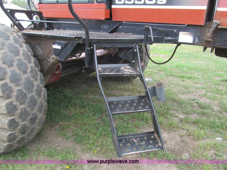 image for item I7032 2003 Hesston 8550S swather