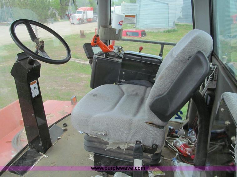 image for item I7032 2003 Hesston 8550S swather