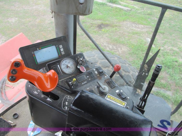 image for item I7032 2003 Hesston 8550S swather