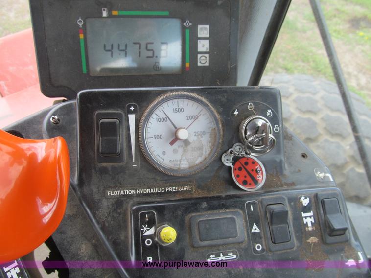 image for item I7032 2003 Hesston 8550S swather