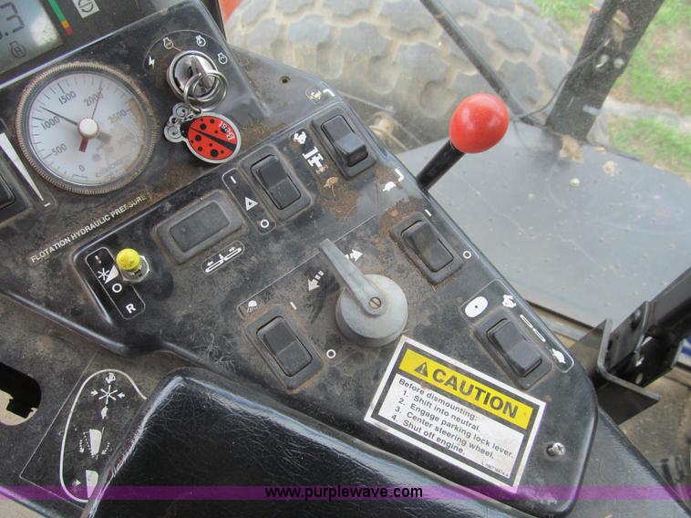 image for item I7032 2003 Hesston 8550S swather