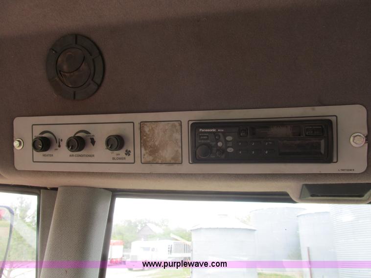 image for item I7032 2003 Hesston 8550S swather