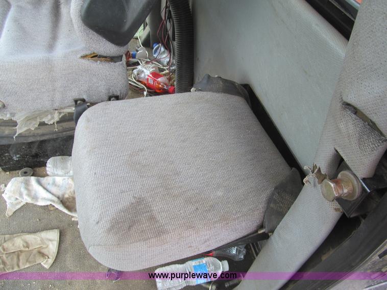 image for item I7032 2003 Hesston 8550S swather