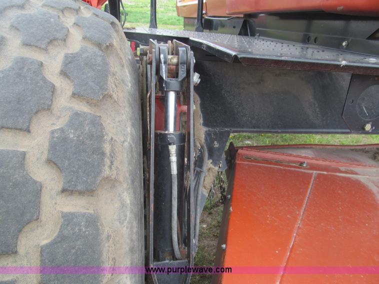 image for item I7032 2003 Hesston 8550S swather