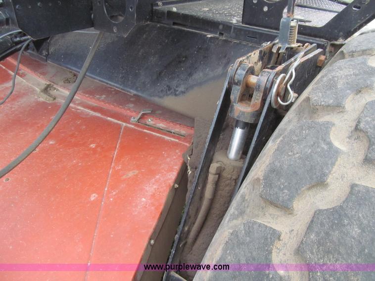 image for item I7032 2003 Hesston 8550S swather