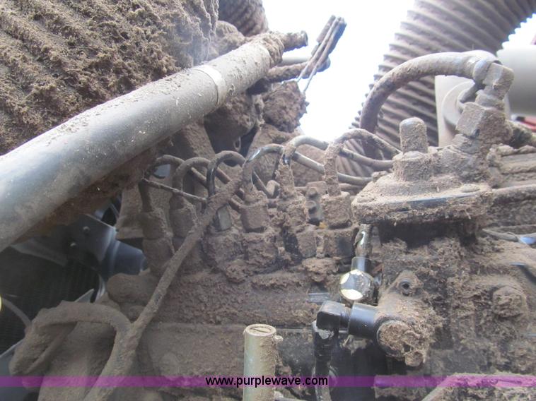 image for item I7032 2003 Hesston 8550S swather