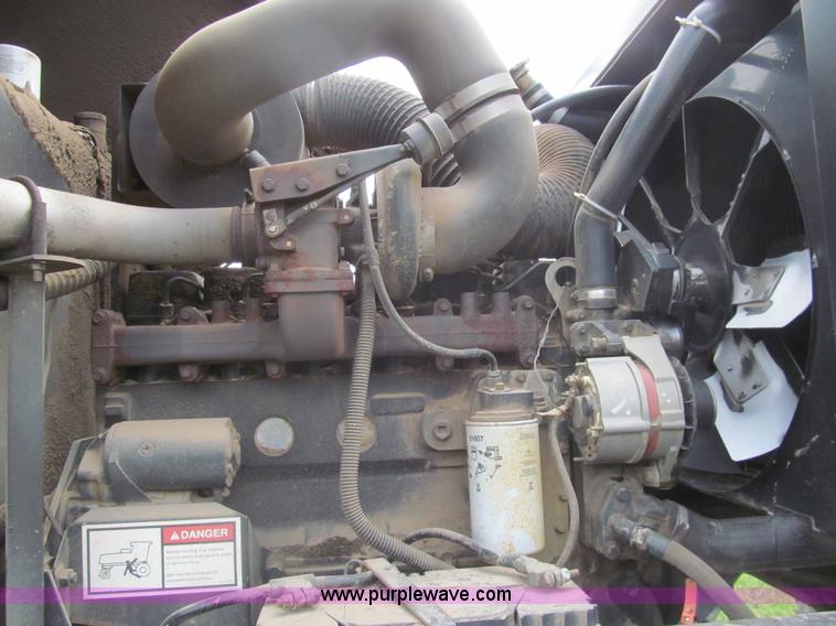 image for item I7032 2003 Hesston 8550S swather