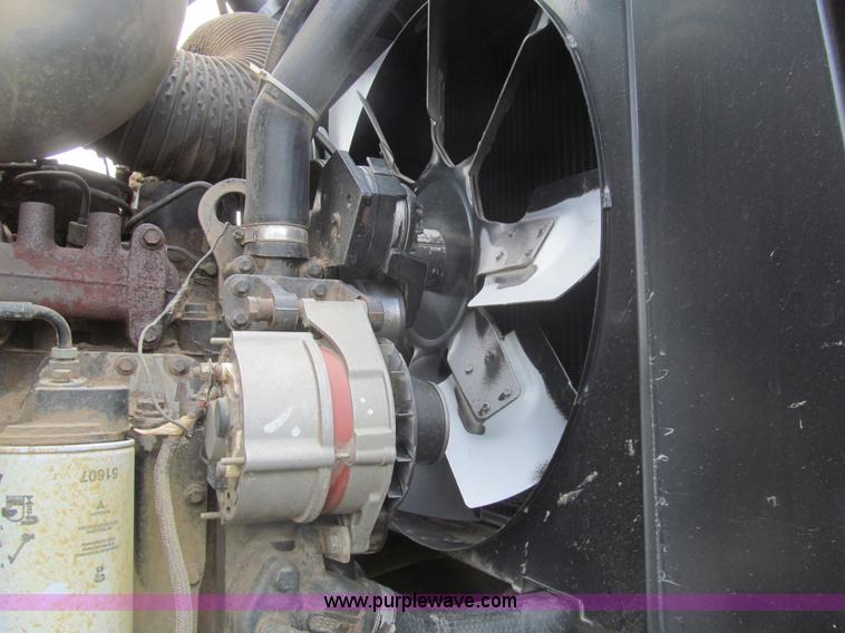 image for item I7032 2003 Hesston 8550S swather