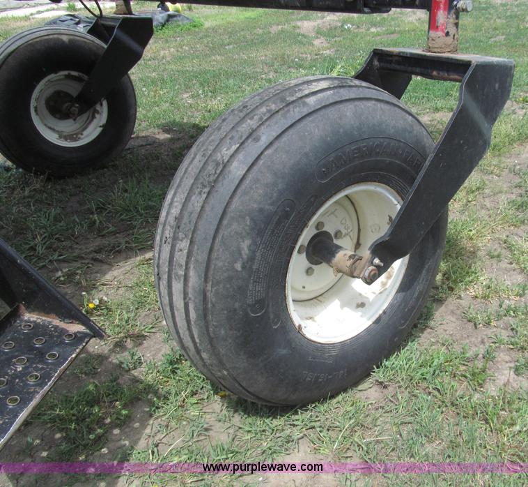 image for item I7032 2003 Hesston 8550S swather