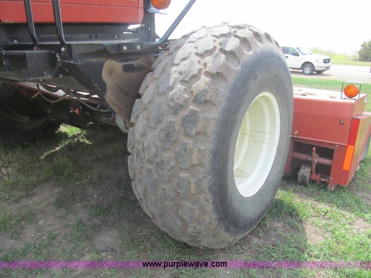 image for item I7032 2003 Hesston 8550S swather