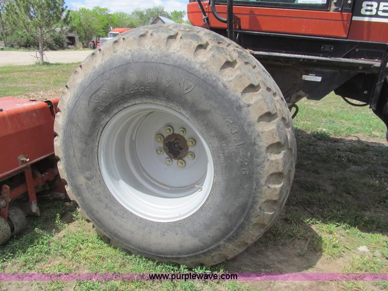 image for item I7032 2003 Hesston 8550S swather